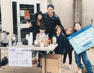 A family volunteers at The Littlest Volunteer event